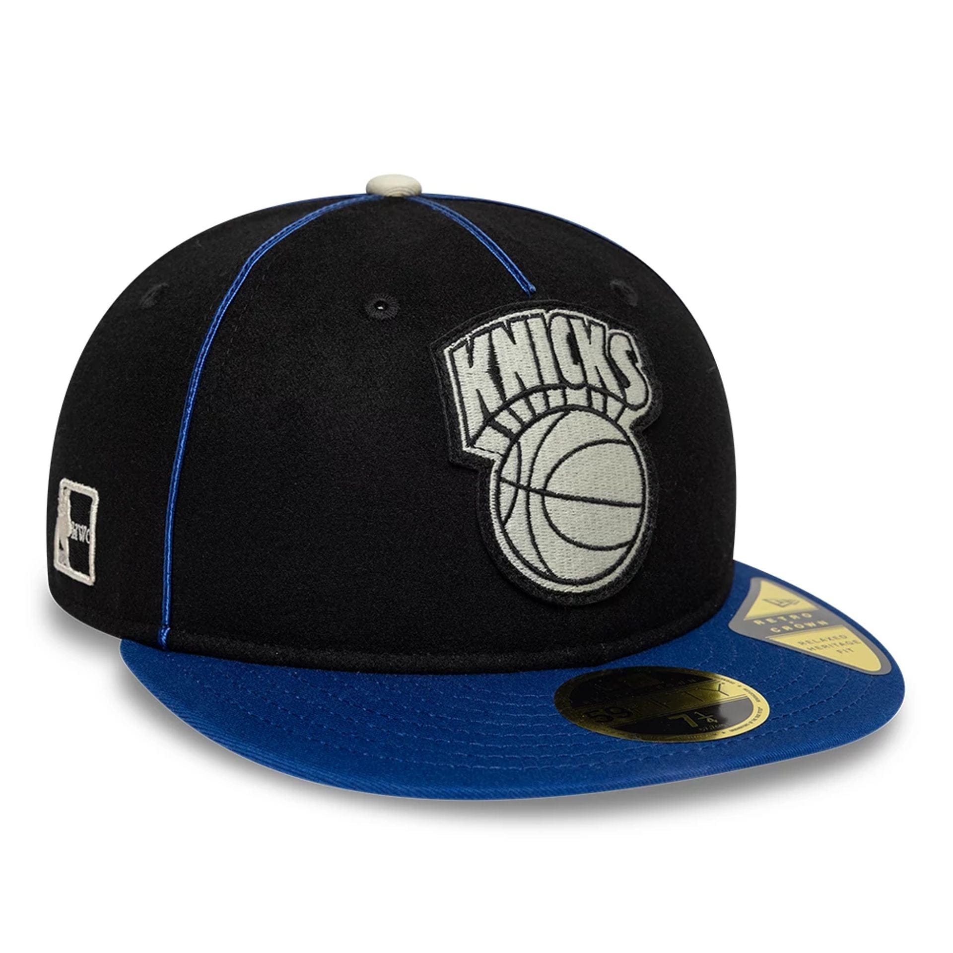 Pictured is this NBA Felt Logo New York Knicks Retro Crown 59FIFTY Fitted cap in dark blue. 1