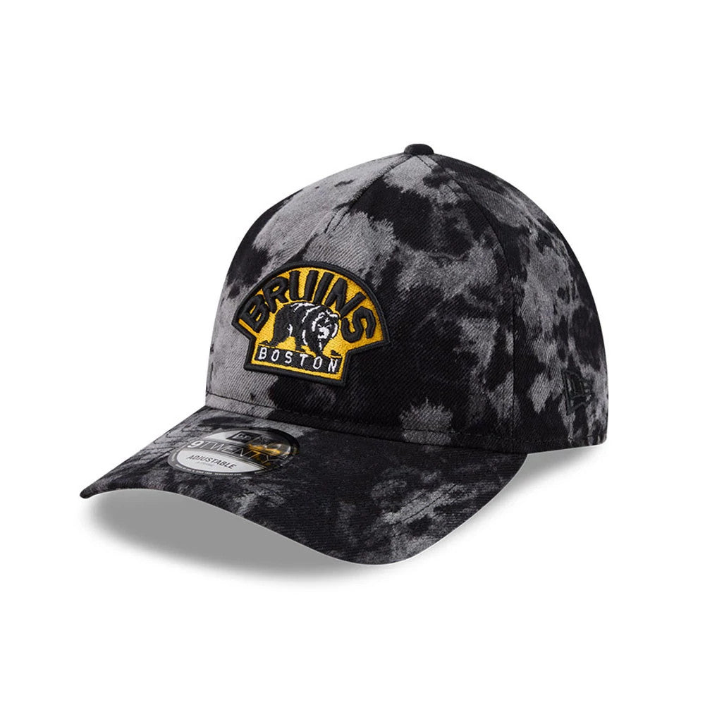 Boston Bruins NHL Bleached Denim Black New Era 9TWENTY A-Frame Adjustable Cap, three-quarter view showing the yellow and black raised embroidered Bruins logo on the front panel, black bleached denim effect.