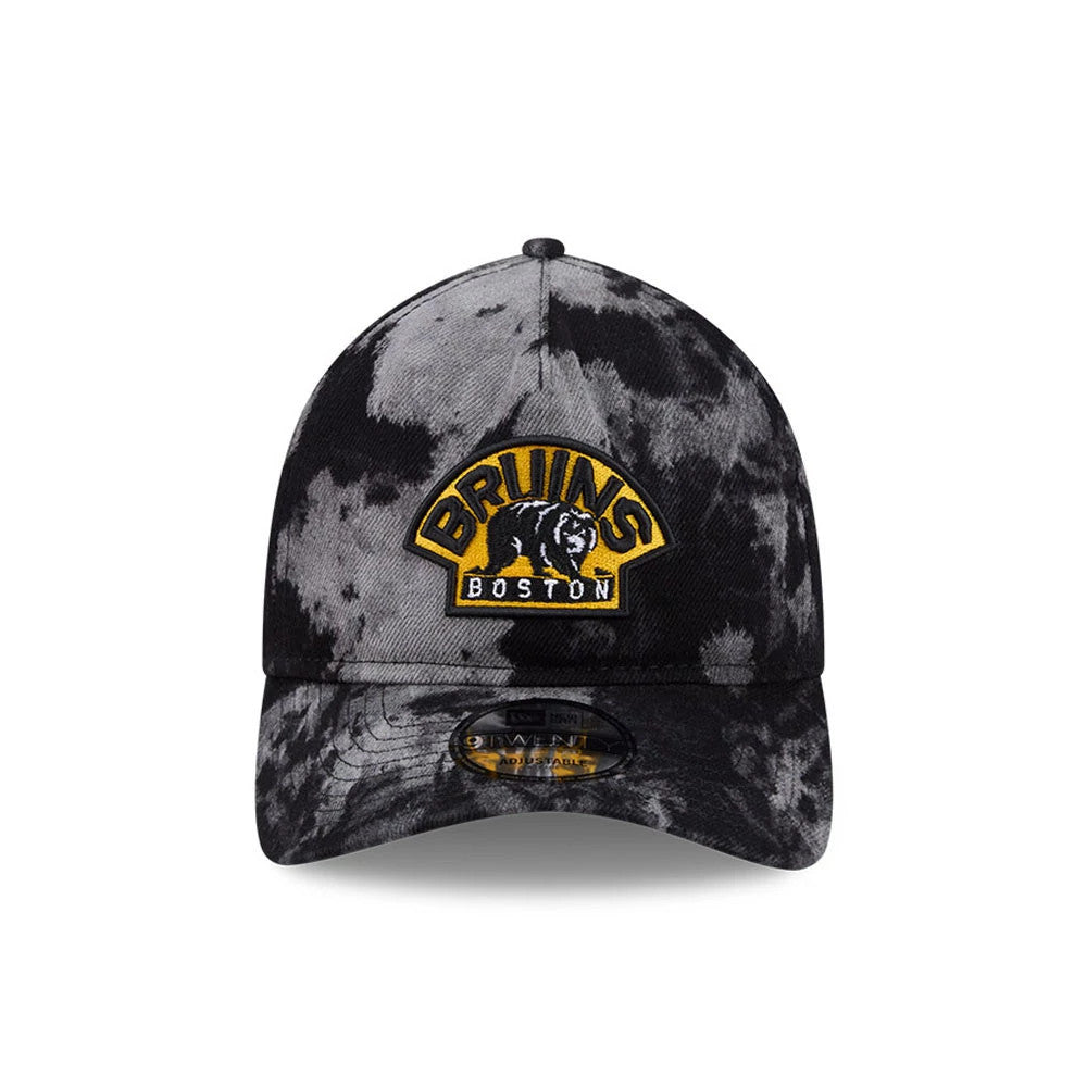 Boston Bruins NHL Bleached Denim Black New Era 9TWENTY A-Frame Adjustable Cap, front view showing a raised embroidered Bruins logo with a bear head on the structured crown, bleached denim pattern throughout, and a 9TWENTY size sticker on the visor.