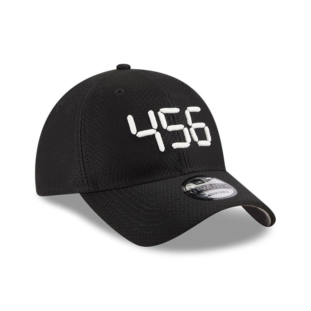Netflix Squid Game 456 Black New Era 9TWENTY Adjustable Cap, front view showing the raised white embroidered number 456 on the structured black crown, with a rounded black visor and a 9TWENTY size sticker on the visor.
