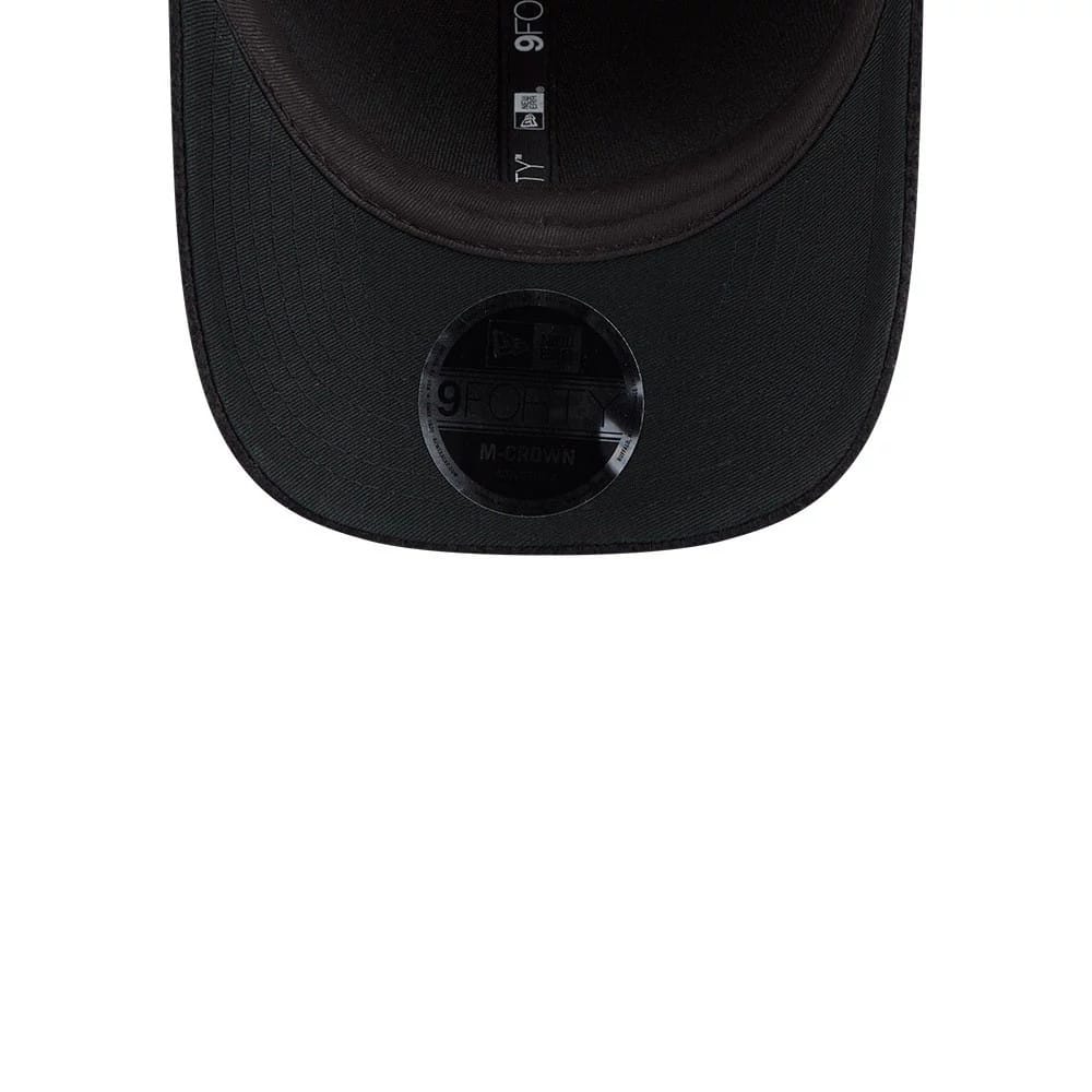 Pictured is this New Era Brushed Fleece 9FORTY M-Crown cap in black. 7