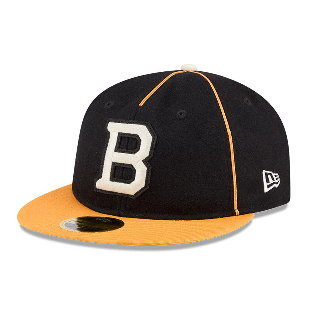 Boston Bruins NHL Felt Logo Black Retro Crown New Era 59FIFTY Fitted Cap, front view showing a large white embroidered B on the front panel, a contrasting yellow visor beneath, and the New Era flag logo on the left side.
