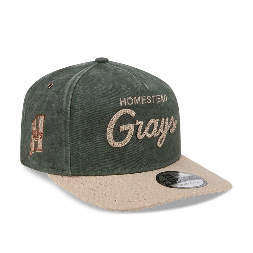 Homestead Grays MLB Negro League Dark Green New Era 19TWENTY Adjustable Cap, front view showing raised Homestead Grays script embroidery on a dark green crown, with a contrasting beige visor and a 19TWENTY size sticker on the flat visor.