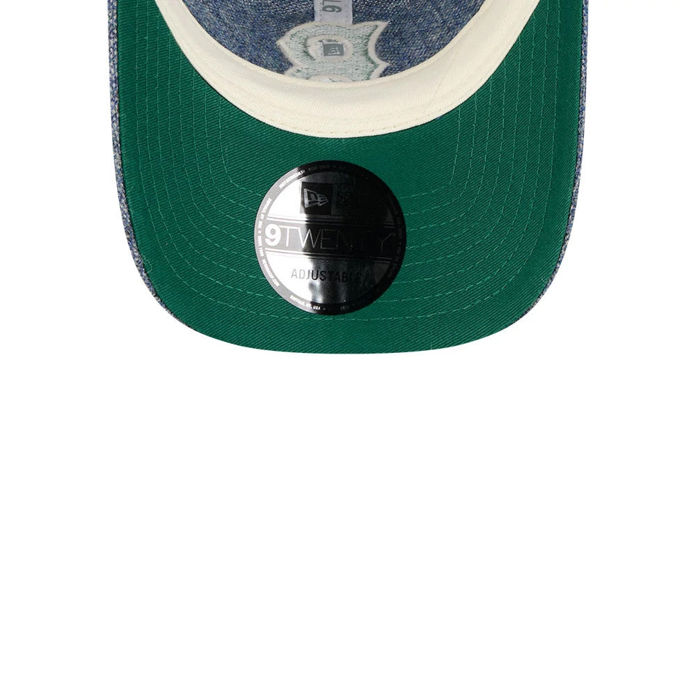 Boston Red Sox MLB X Moon Blue New Era 9TWENTY Adjustable Cap, inside view showing the green undervisor, a black 9TWENTY size sticker on the visor, and white taping with the New Era logo along the seams.