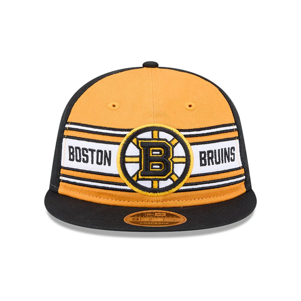 Bruins NHL Team Stripes Black Retro Crown New Era 9FIFTY Adjustable Cap, front view showing the yellow embroidered Boston Bruins logo on the crowned panel, black visor with tan 9FIFTY size sticker, and distinctive horizontal stripe details.