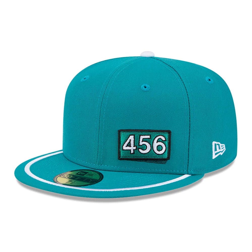Netflix Squid Game 456 Patch Green New Era 59FIFTY Fitted Cap, front view showing the raised embroidered 456 patch on the front panel, white New Era flag logo on the left side, and a circular gold 59FIFTY size sticker on the flat visor.