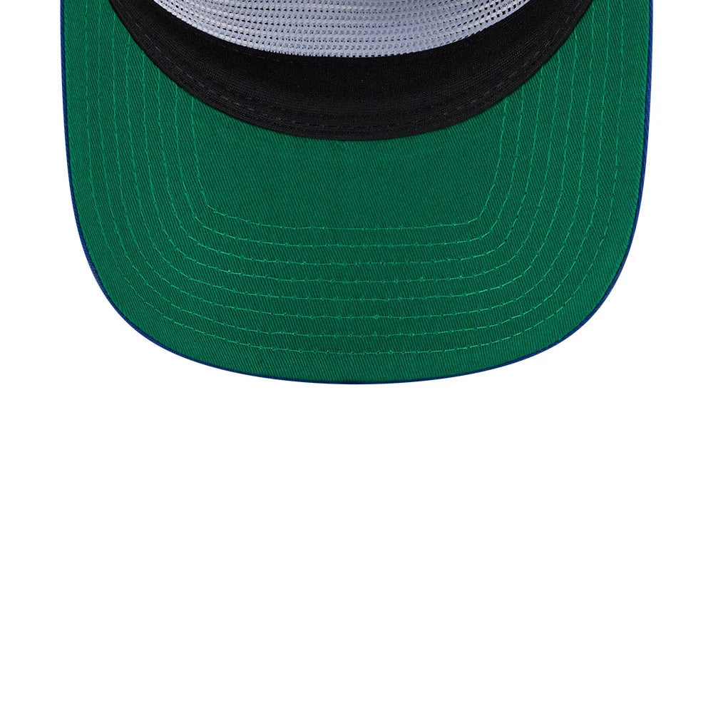 New York Rangers NHL Felt Logo Blue New Era 19TWENTY Adjustable Cap, inside view showing the green undervisor, a black sweatband forming a contrast against the white mesh crown, and blue stitching lines along the edge of the visor.