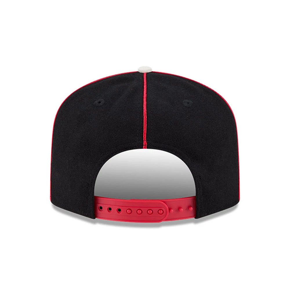 Chicago Blackhawks NHL Felt Logo Black New Era 19TWENTY Adjustable Cap, rear view showing a red adjustable snapback closure, black and red panel piping, and the black crown with a grey top button at the apex.