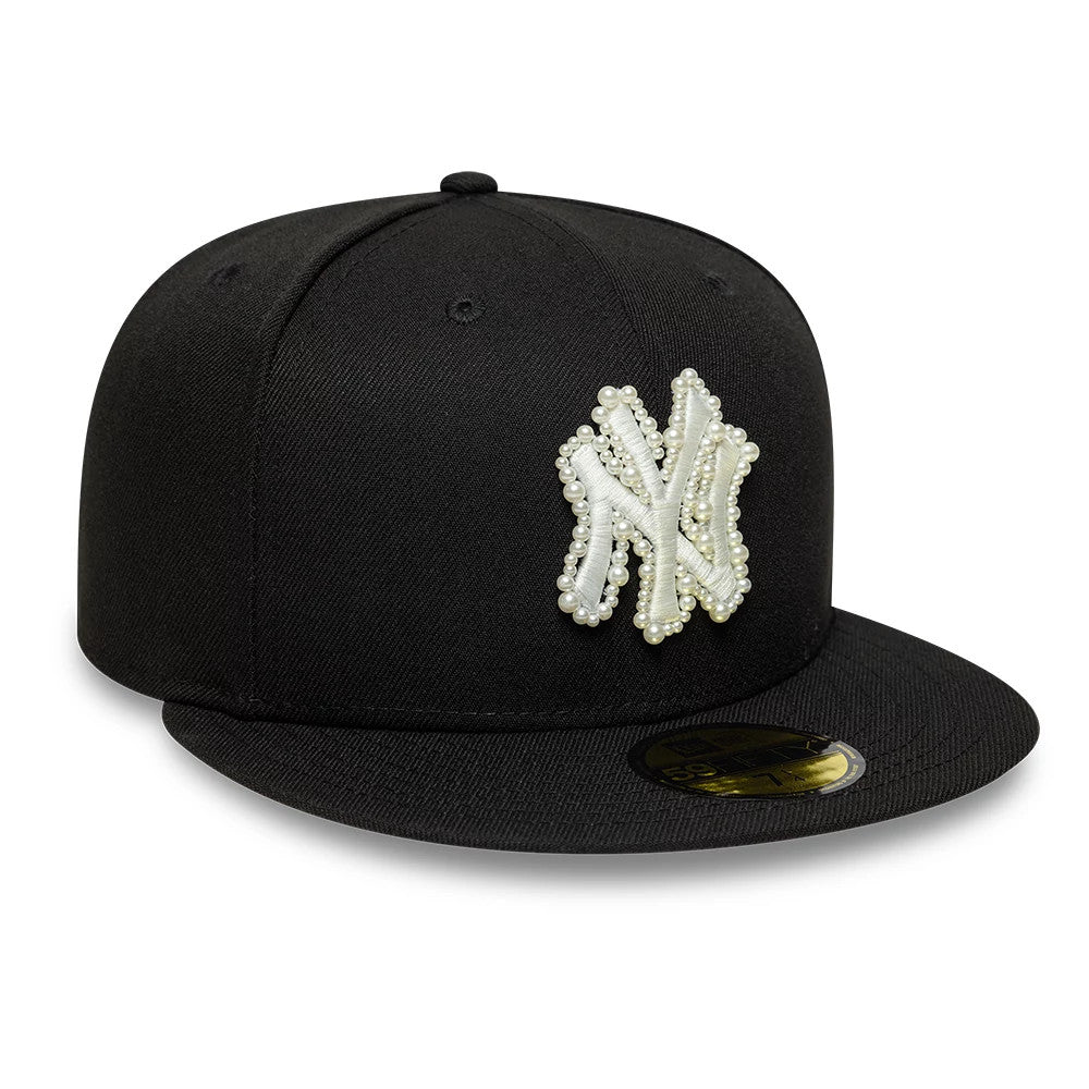 New York Yankees MLB Faux Pearl Black New Era 59FIFTY Fitted Cap, three-quarter view showing a pearl-embellished NY logo on the front panel, a black flat visor, and a gold 59FIFTY size sticker on the visor.
