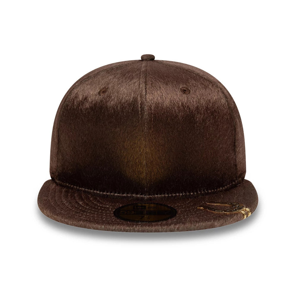 New Era Faux Pony Dark Brown 59FIFTY Fitted Cap, front view showing the textured dark brown faux pony fabric on the structured crown, paired with a matching flat visor, and a gold 59FIFTY size sticker placed centrally on the visor.