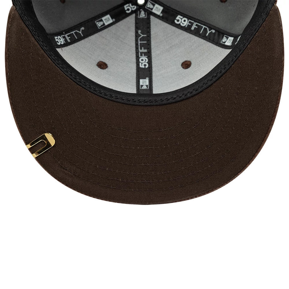 Pictured is this New Era Faux Pony 59FIFTY Fitted cap in dark brown. 7