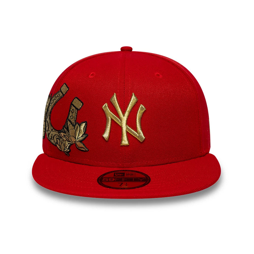 New York Yankees MLB Horseshoe Red New Era 59FIFTY Fitted Cap, front view showing a large gold embroidered NY logo and an intricate horseshoe design on the red structured crown, with a red flat visor featuring a gold 59FIFTY size sticker.