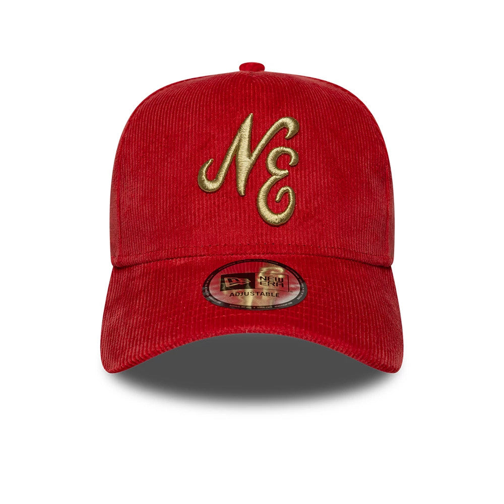 New Era Cord Red 9FORTY E-Frame Adjustable Cap, front view showing raised gold NE embroidery on the red corduroy crown, with a slightly curved visor and a 9FORTY size sticker in the centre of the visor.
