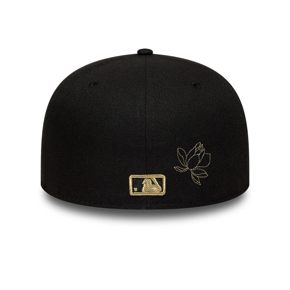 New York Yankees MLB Floral Black New Era 59FIFTY Fitted Cap, rear view showing a gold embroidered MLB Batterman logo at the centre back, with a delicate gold floral motif to the right, set against a structured black crown.