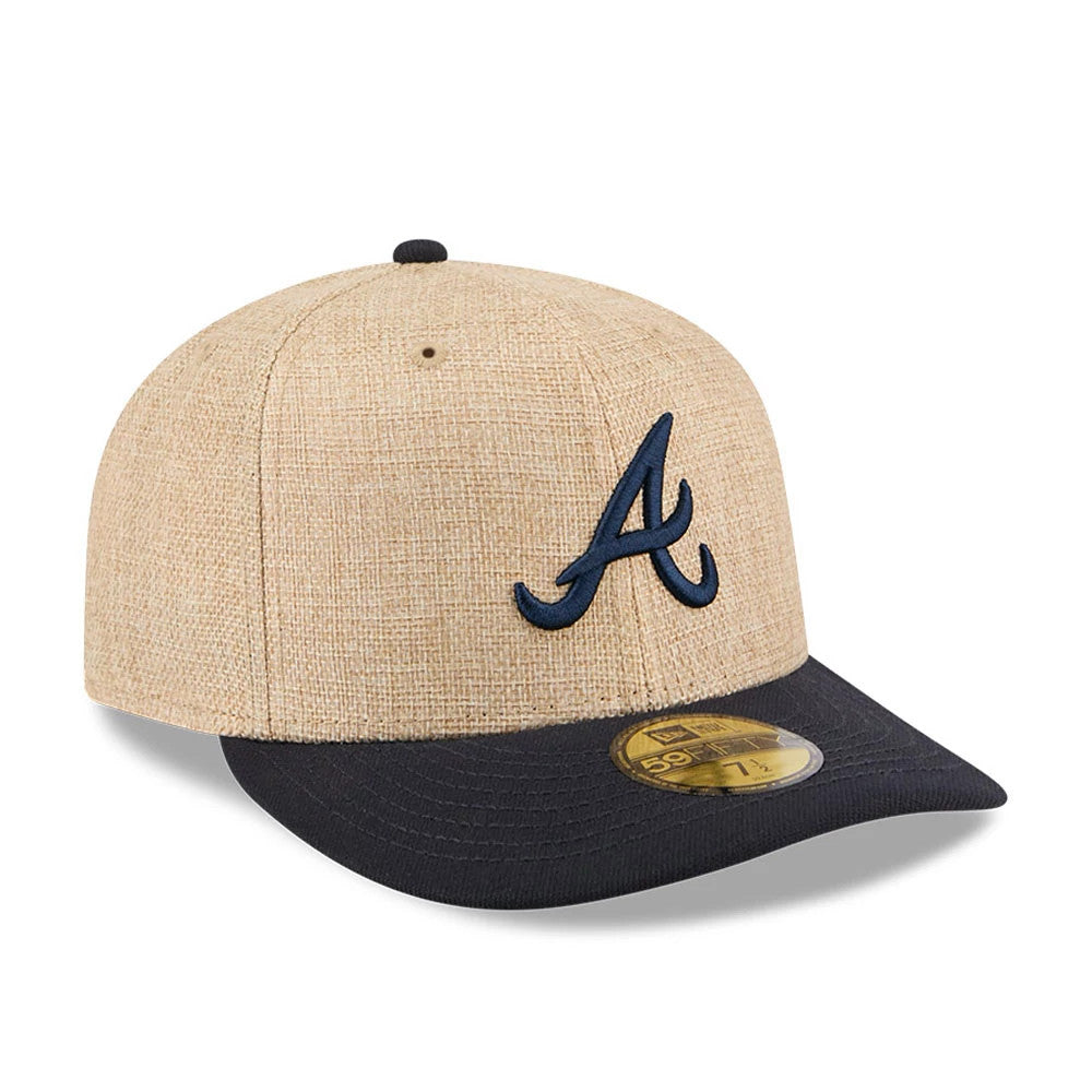 Atlanta Braves MLB Twine Beige New Era 59FIFTY Fitted Cap, three-quarter view showing the navy raised embroidered team logo on the front beige panel, contrasted with a dark navy visor and a gold 59FIFTY size sticker on the visor.