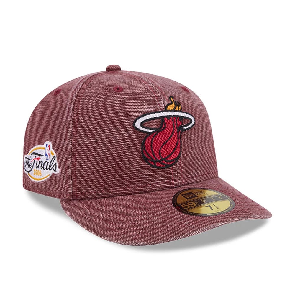 Miami Heat NBA Hardwood Classic Red New Era 59FIFTY Fitted Cap, three-quarter view showing the raised embroidered Miami Heat logo on the front panel, a Finals patch on the right side, and a gold 59FIFTY size sticker on the curved red visor.