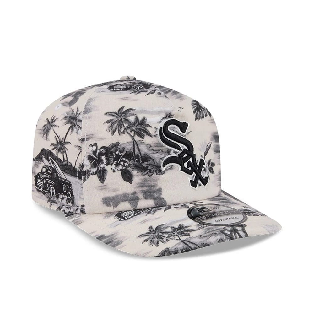 Chicago White Sox MLB Tropics Cream New Era 19TWENTY Adjustable Cap, three-quarter view showcasing the raised black embroidered logo on the patterned cream front panel, with a tropical palm and car design.