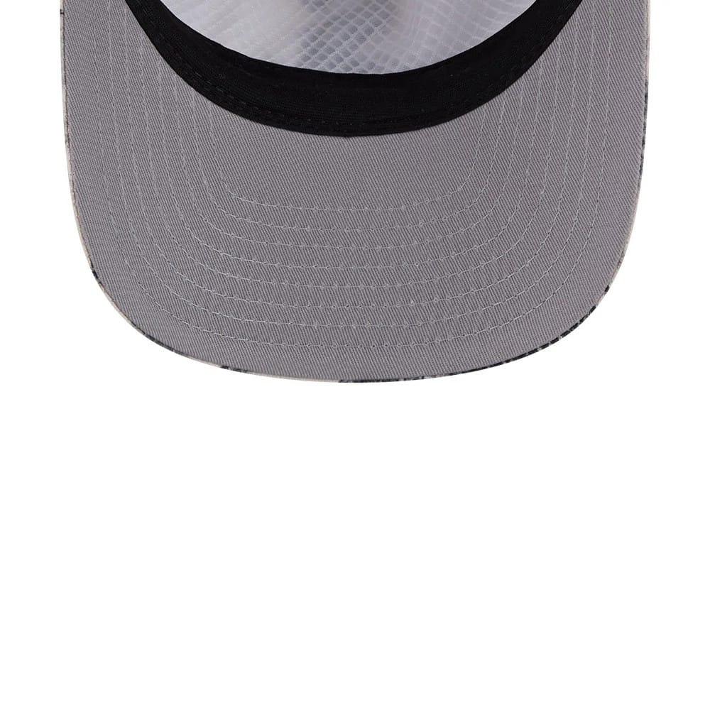 Chicago White Sox MLB Tropics Cream New Era 19TWENTY Adjustable Cap, inside view showing the grey undervisor with contrasting black edge, a black sweatband encircling the interior, and detailed stitching pattern on the inside of the visor.