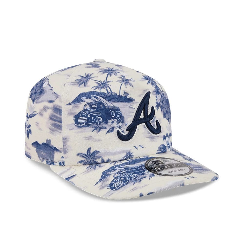 Atlanta Braves MLB Tropics Navy New Era 19TWENTY Adjustable Cap, three-quarter view showing a raised navy embroidered A logo on the front panel, a tropical print with vehicles and palm trees on the crown and visor.