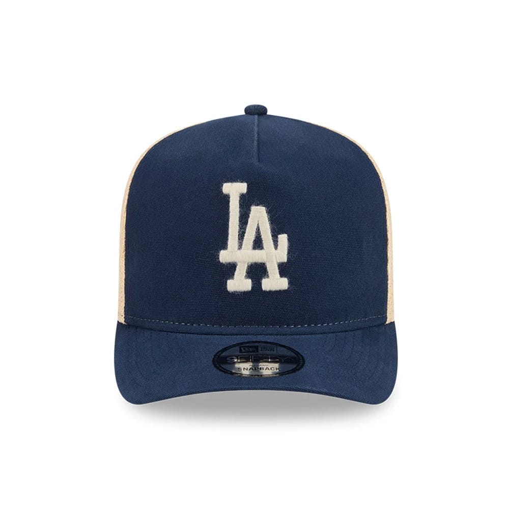 Pictured is this MLB Grained LA Dodgers 9FIFTY A-Frame Snapback cap in dark blue. 3