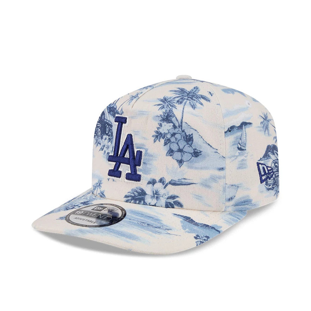 LA Dodgers MLB Tropics Dark Blue New Era 19TWENTY Adjustable Cap, front view showing the raised blue embroidered LA logo on a tropical patterned crown, blue-accented visor, and a 19TWENTY size sticker on the visor's top surface.