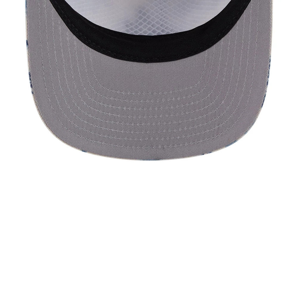 LA Dodgers MLB Tropics Dark Blue New Era 19TWENTY Adjustable Cap, inside view showing a grey undervisor, a black sweatband lining the circumference of the cap, and a white internal taping with a grid pattern.