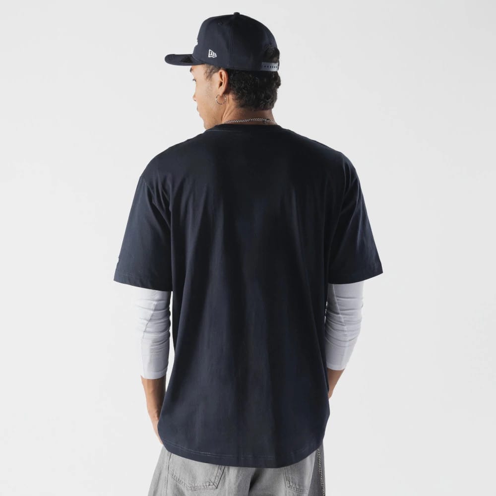 The model is wearing this MLB Life Graphic New York Yankees T-Shirt in navy. 2
