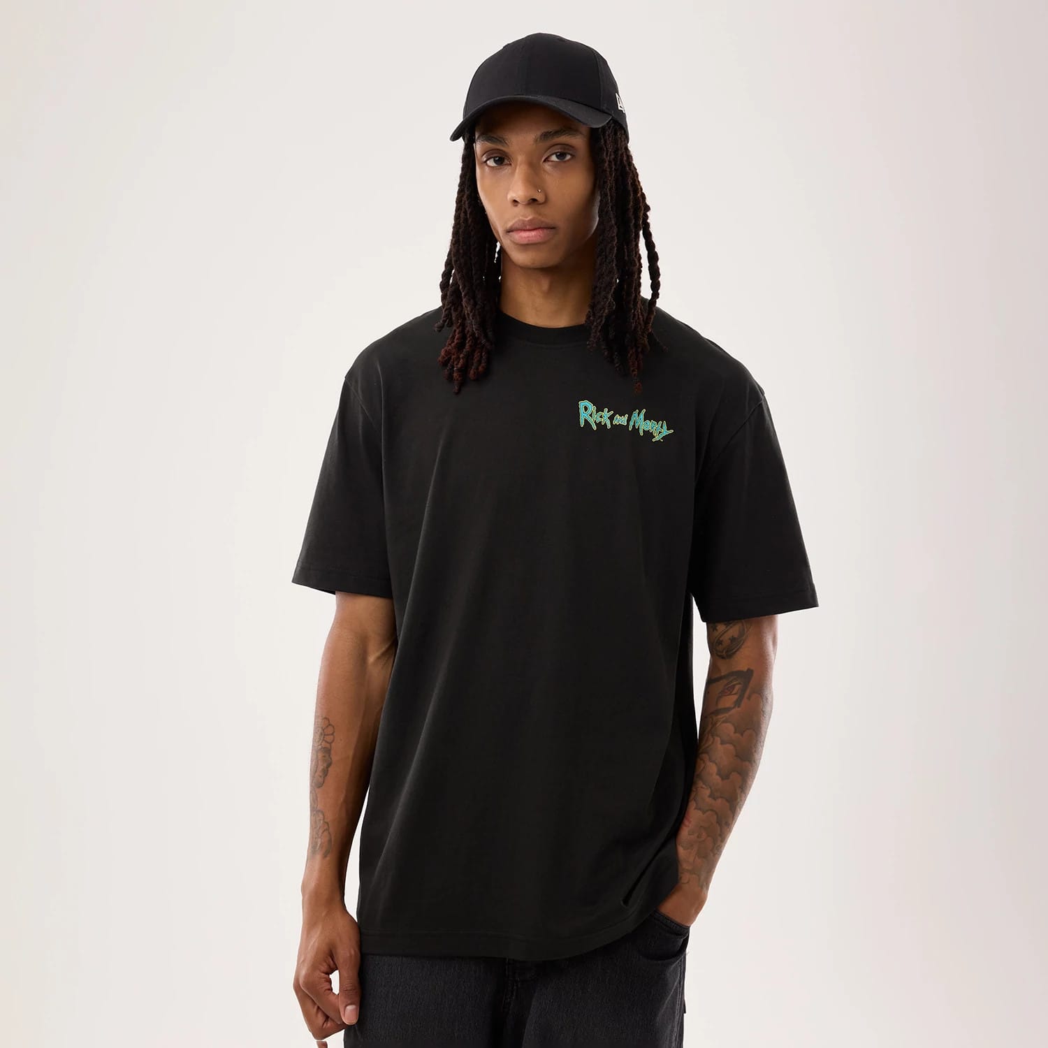 The model is wearing this Rick And Morty Portal Gun T-Shirt in black. 1