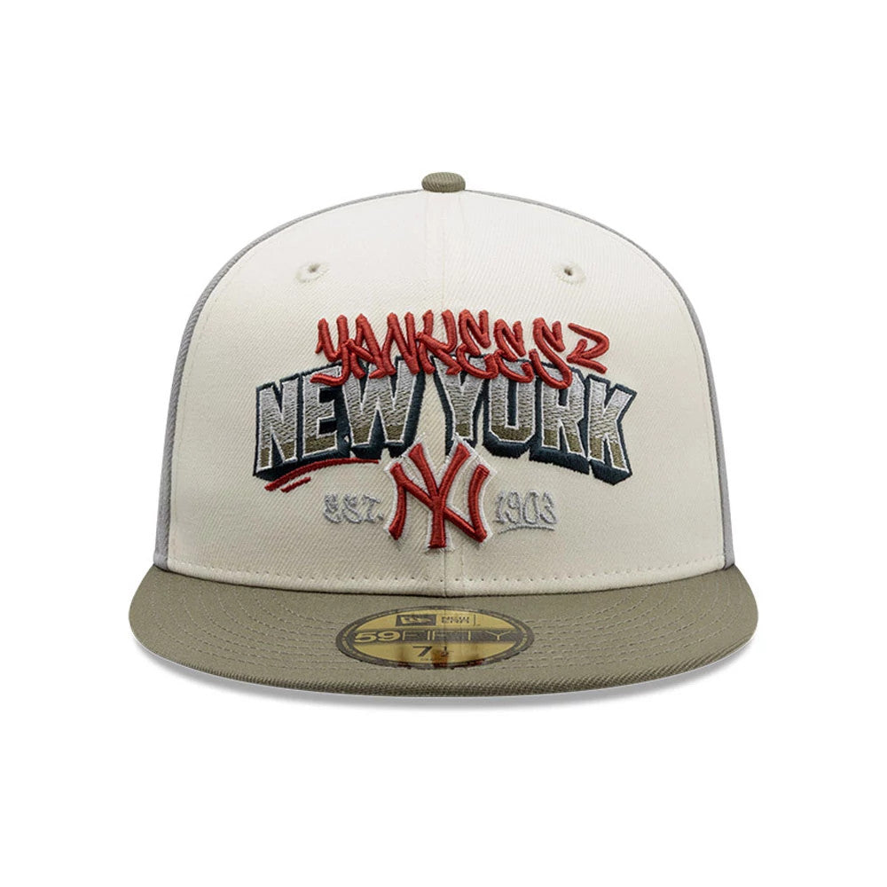 New York Yankees MLB Tagged Grey New Era 59FIFTY Fitted Cap, front view showing raised embroidery of graffiti-style red Yankees script and large grey New York text, with red NY logo and gold 59FIFTY size sticker on the flat khaki visor.