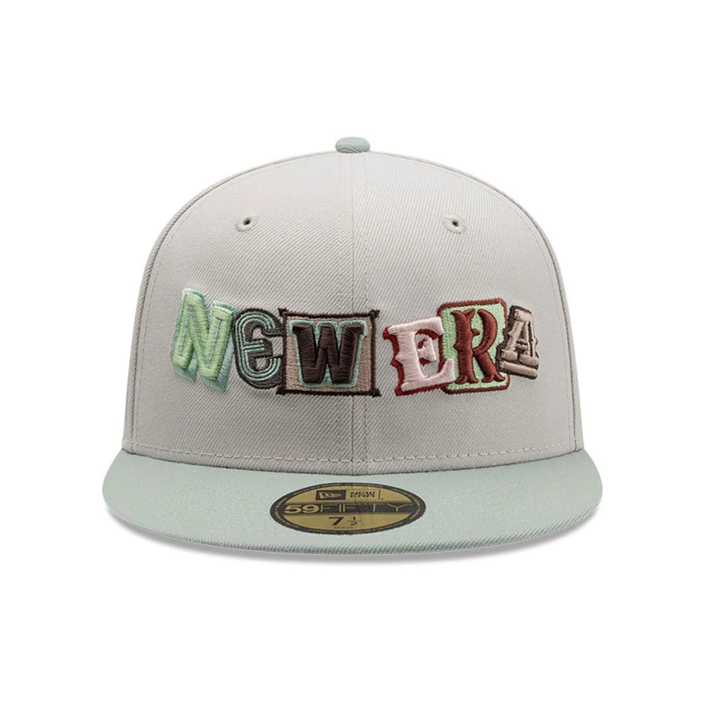 New Era DIY Note Light Beige 59FIFTY Fitted Cap, front view showing multicoloured, raised embroidered New Era lettering on the front panel, paired with a matching beige visor and gold 59FIFTY size sticker on the flat visor.