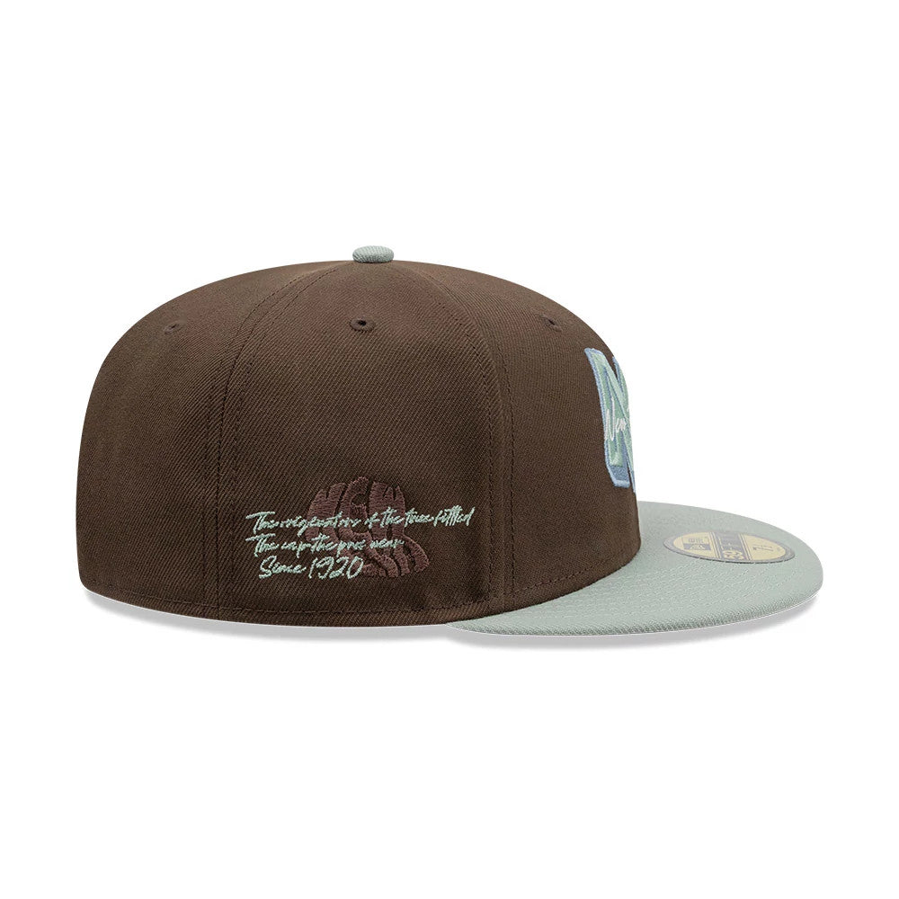 New Era DIY Note Dark Brown 59FIFTY Fitted Cap, side view showing a light green embroidered script and graphic design on the left panel, light green flat visor with a gold 59FIFTY size sticker, and a structured brown crown.