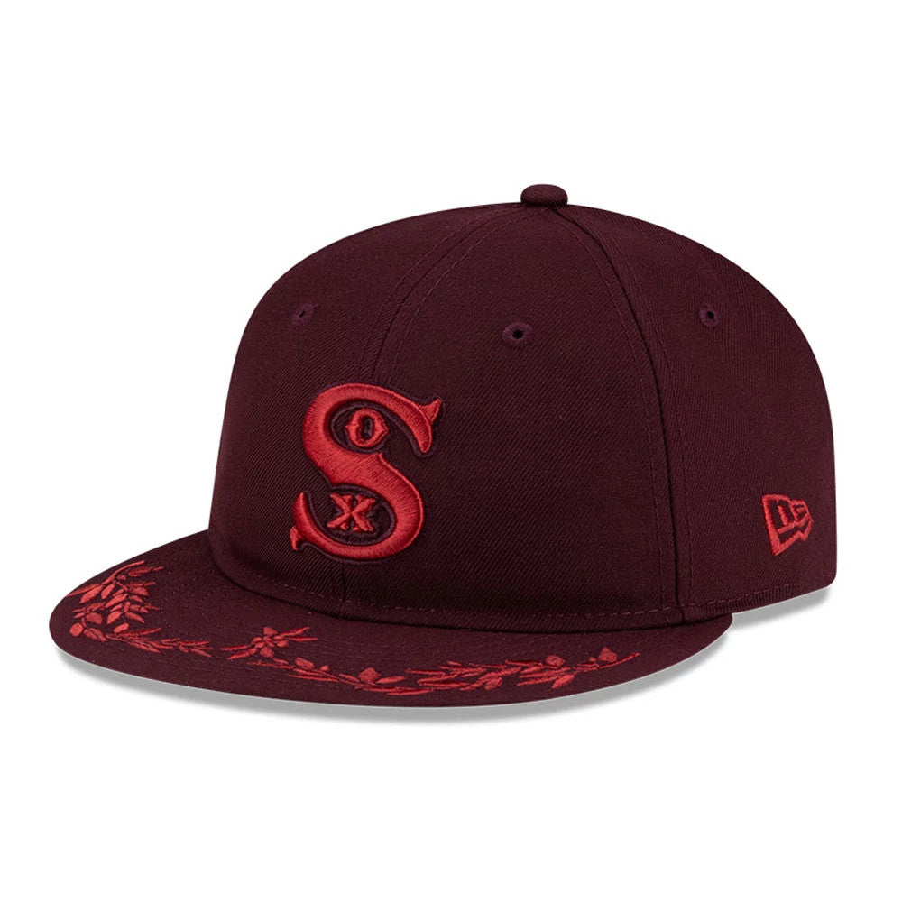 Pictured is this MLB Flourishes Chicago White Sox Retro Crown 9FIFTY cap in dark purple. 3