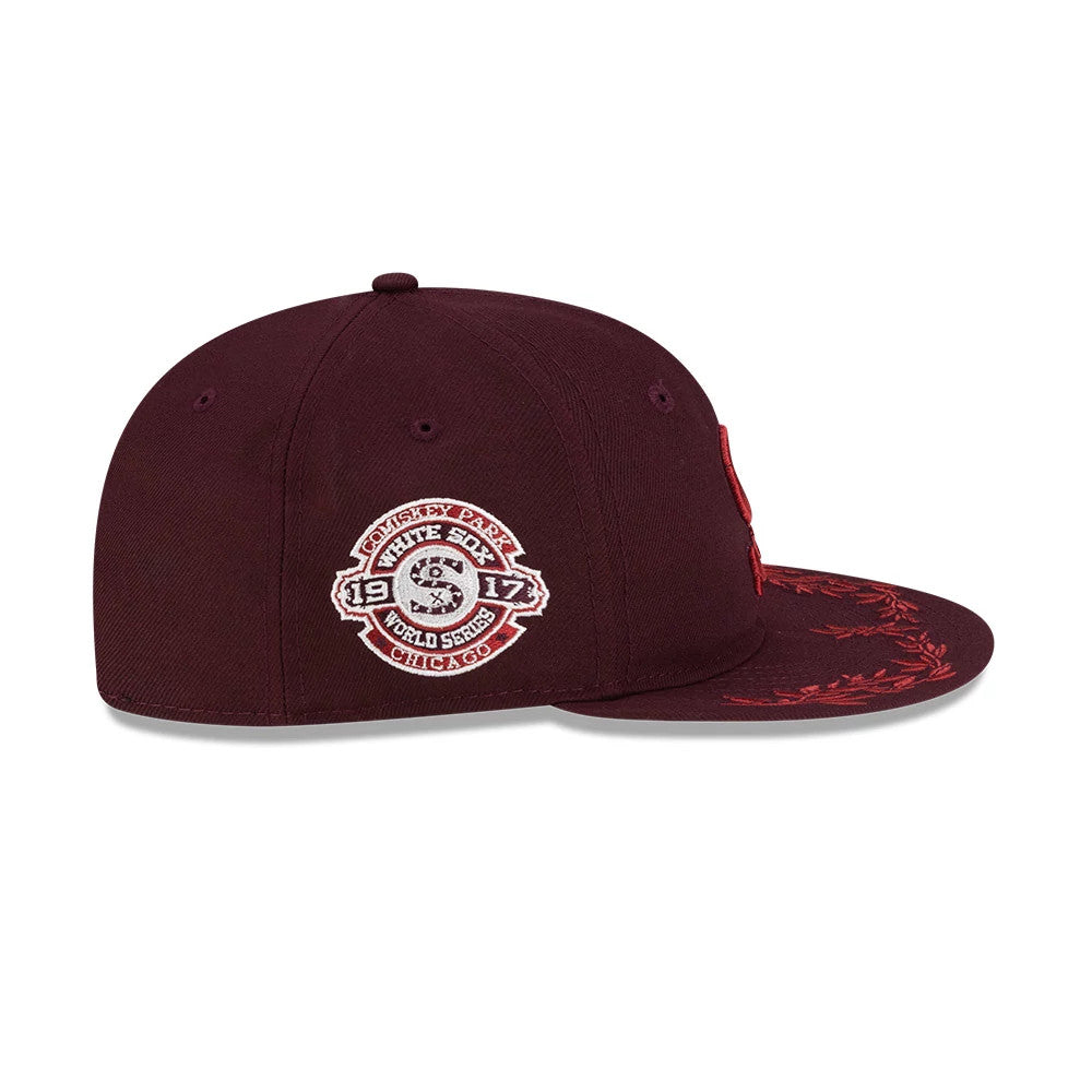 Pictured is this MLB Flourishes Chicago White Sox Retro Crown 9FIFTY cap in dark purple. 4