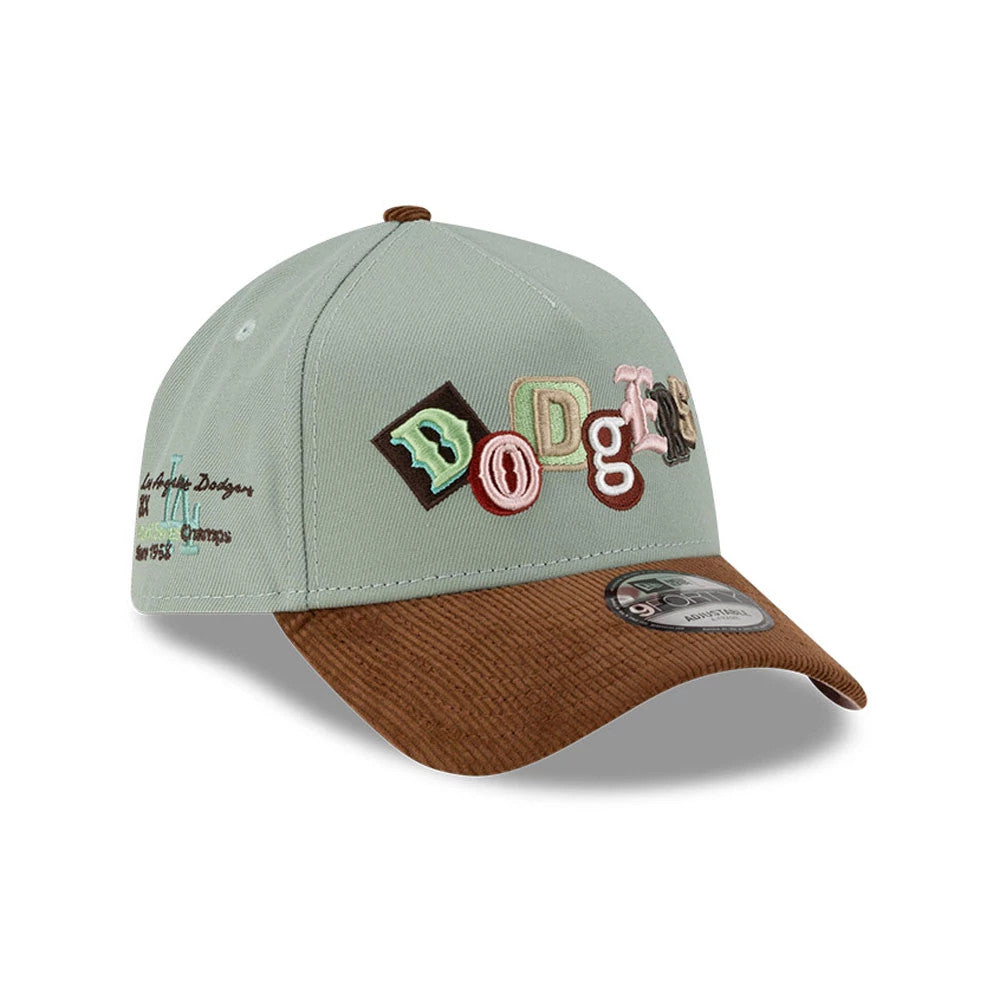 LA Dodgers MLB DIY Note Green New Era 9FORTY A-Frame Cap, front view showing the multicoloured raised embroidered Dodgers lettering on the structured green crown, with a brown corduroy curved visor and a 9FORTY size sticker on the front.