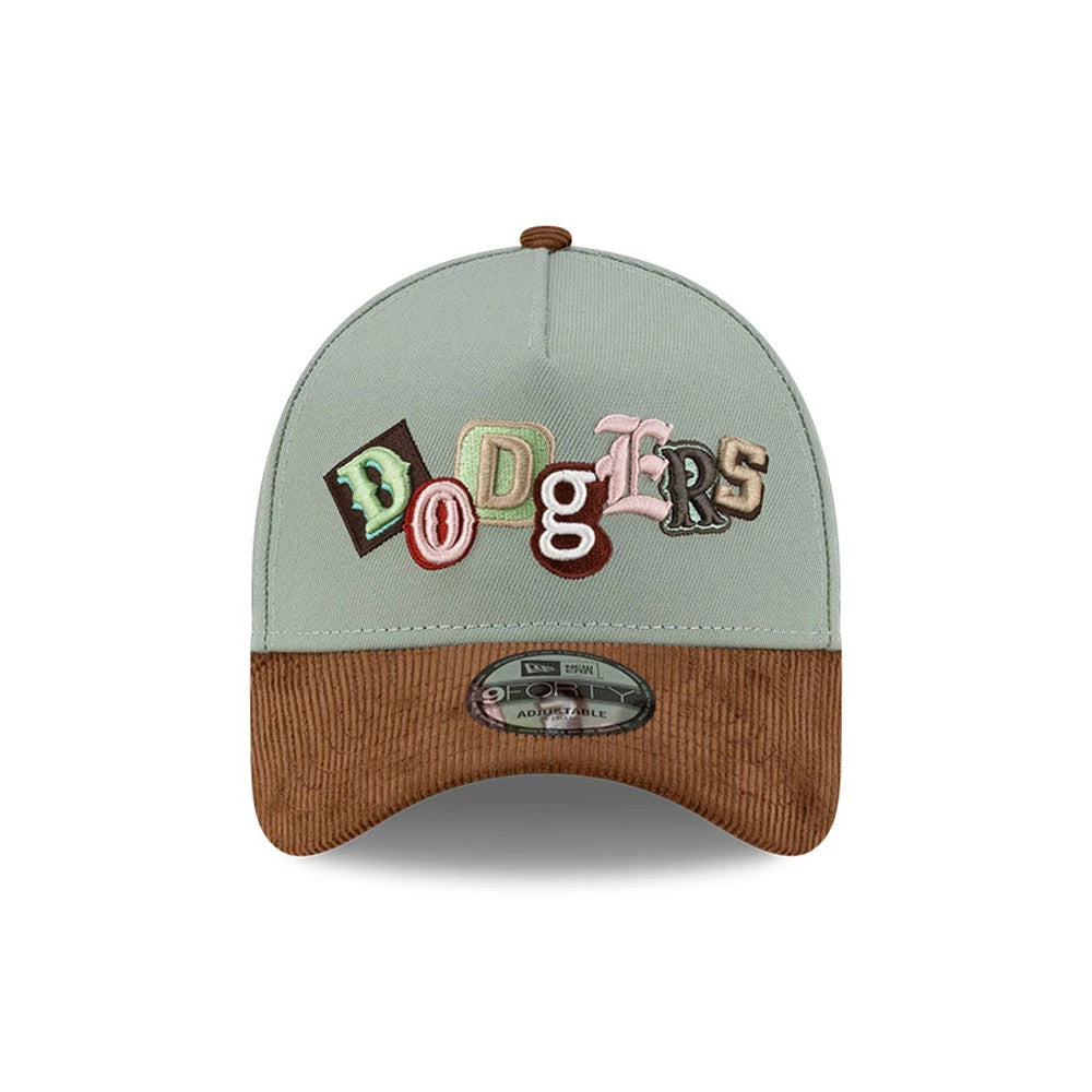 LA Dodgers MLB DIY Note Green New Era 9FORTY A-Frame Cap, front view showing multi-coloured raised embroidery of 'DODGERS' across the front panel, contrasting brown textured visor, and a 9FORTY size sticker on the curve of the visor.