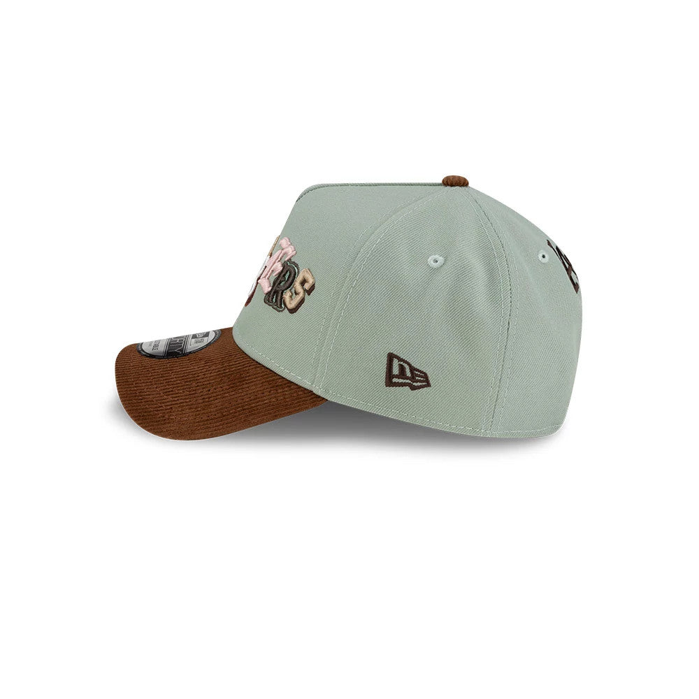 LA Dodgers MLB DIY Note Green New Era 9FORTY A-Frame Cap, side view showing the brown embroidered New Era flag logo on the left side, a brown corduroy visor, and the green structured crown with raised LA Dodgers lettering on the front.