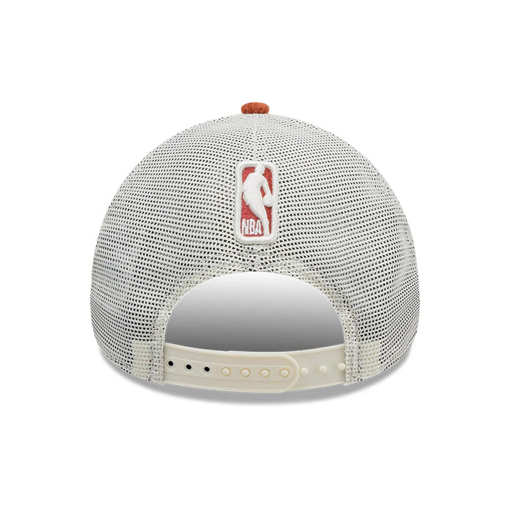 Chicago Bulls NBA Old English White New Era 9FORTY A-Frame Cap, rear view showing the red and white embroidered NBA logo patch at the centre of the back mesh panels, with a brown top button and an adjustable white snapback closure.
