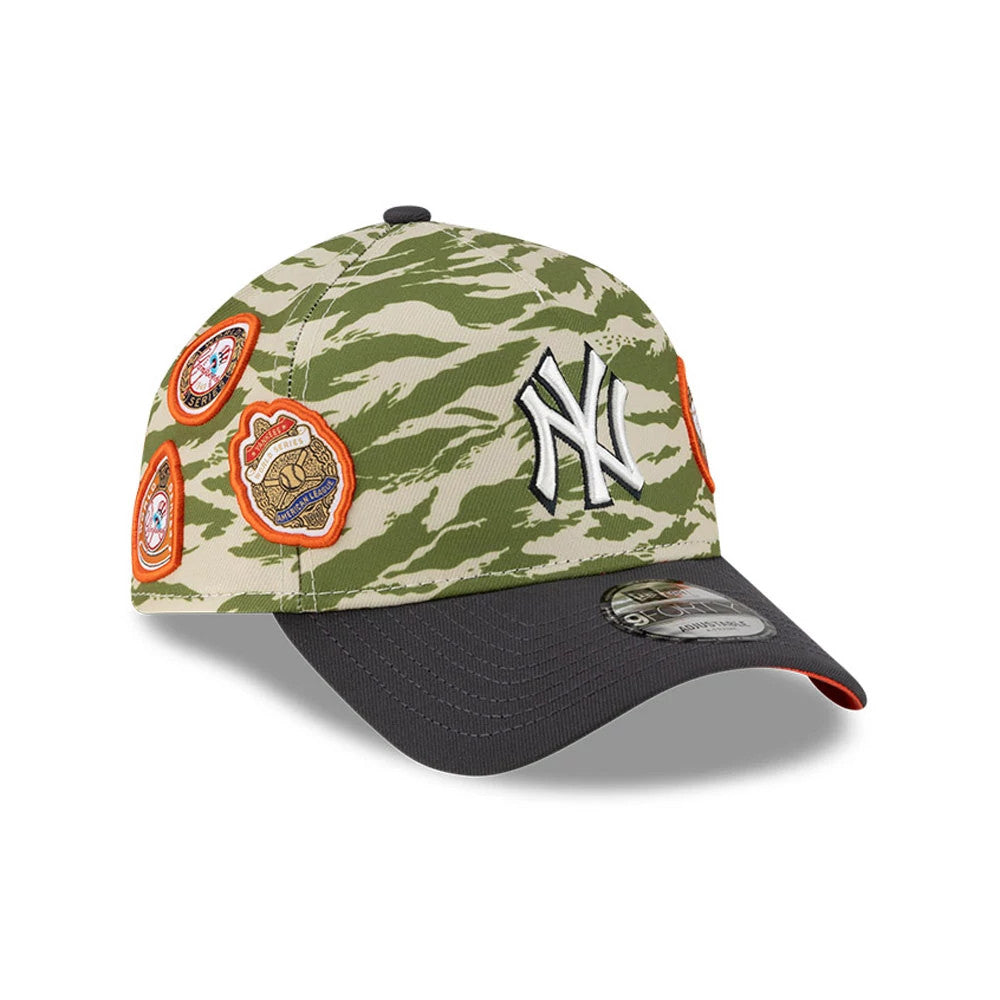 New York Yankees MLB Tiger Camo Green New Era 9FORTY A-Frame Cap, three-quarter view showing a white raised embroidered NY logo on the camo front panel, black curved visor with an orange underside, and three orange-bordered patches on the side.