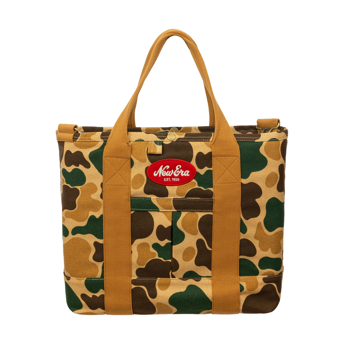 New Era Duck Camo Tote Bag, front view showing a camouflage pattern with green, brown, and tan patches, dual tan handles, and an embroidered red New Era logo set on a front pocket with topstitch details.