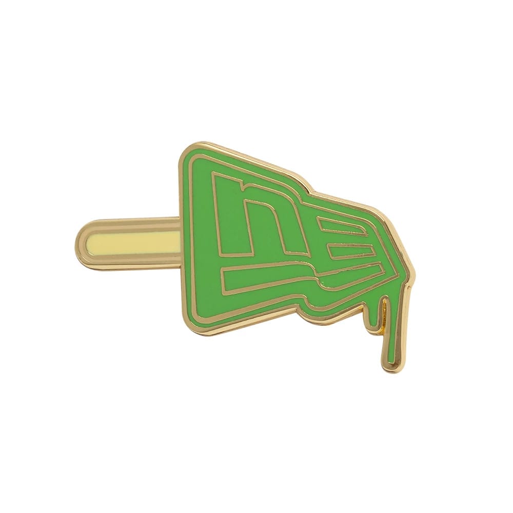 Pictured is this New Era Lolly Pin Badge in open green. 1