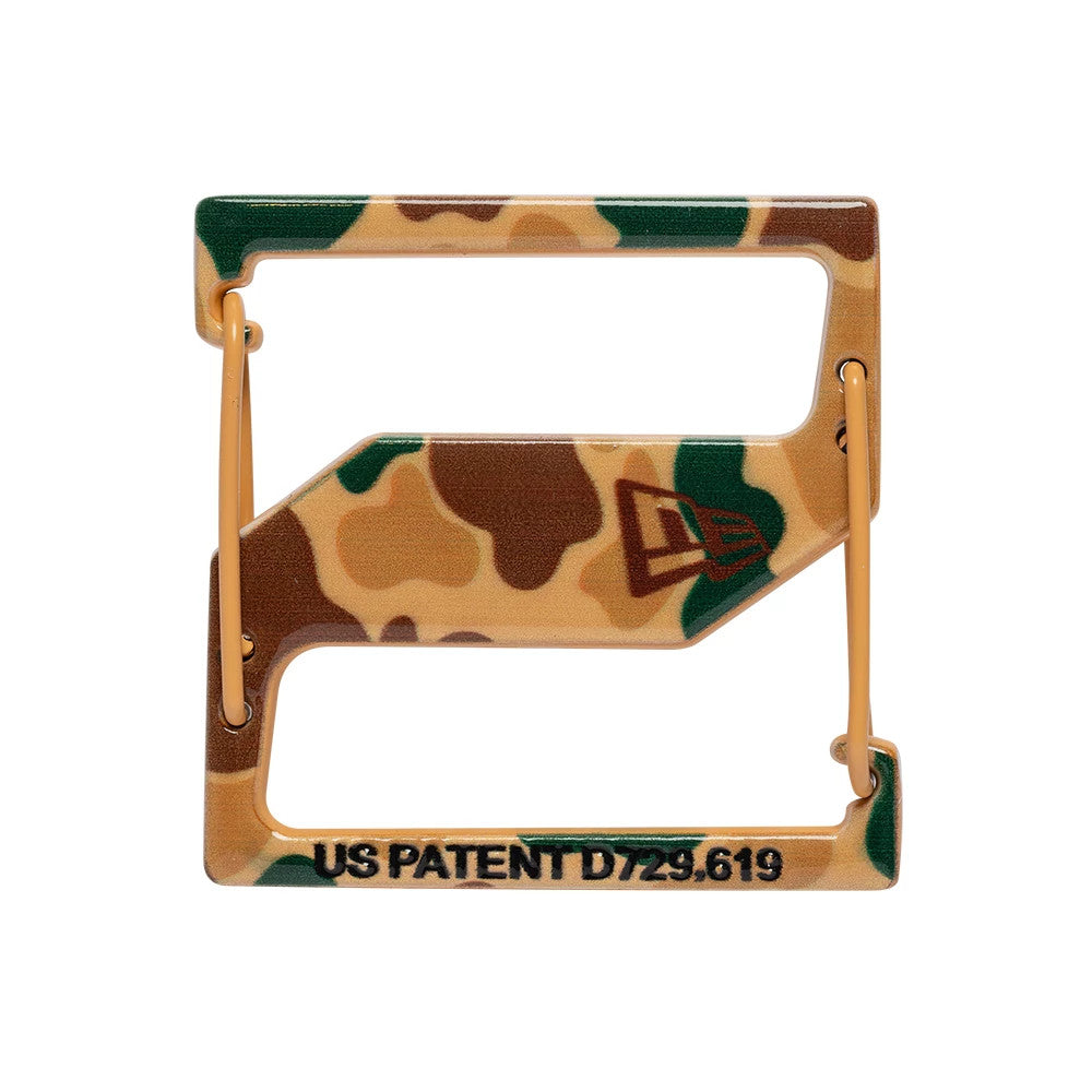 New Era Duck Camo Cap Clip, front view displaying a rectangular clip with a duck camo pattern featuring green and brown hues, a New Era flag logo on the side, and black patent text along the bottom edge.