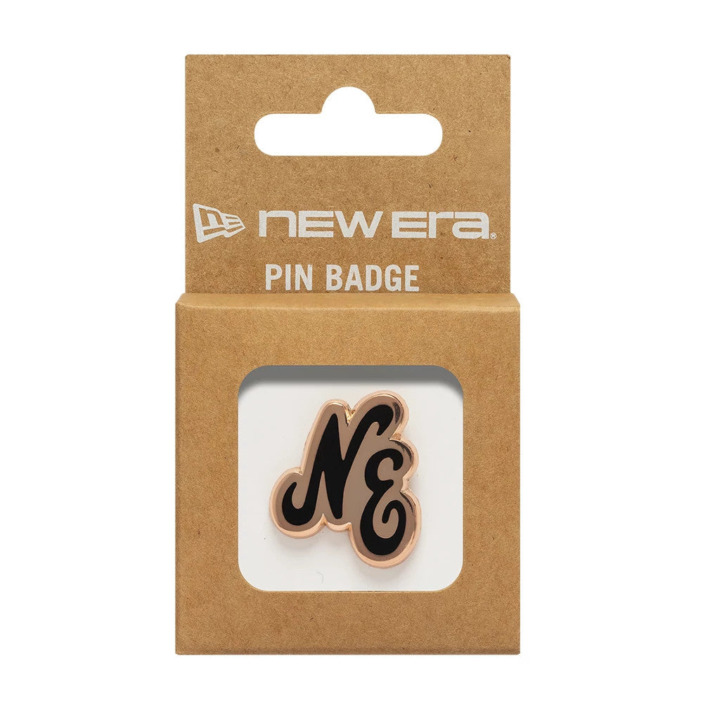 Pictured is this New Era Script Herritage Connect Rose Gold Pin Badge in rose gold. 3