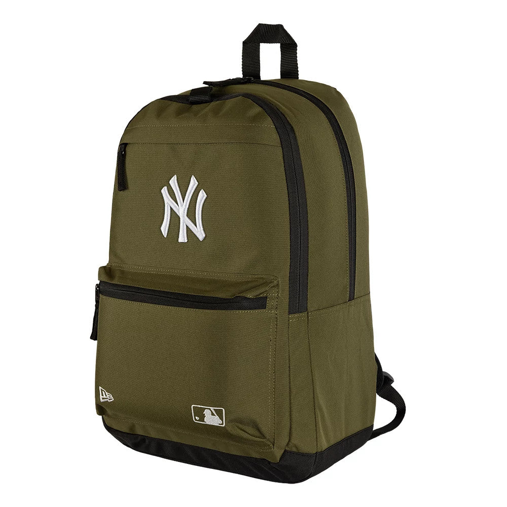 New Era New York Yankees MLB Dark Green Delaware Backpack, three-quarter view highlighting the white embroidered Yankees logo on the front pocket, a zip closure on the main compartment, and a black base with a printed New Era logo near the bottom.