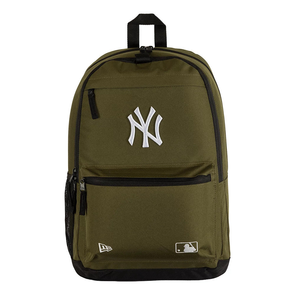 New Era New York Yankees MLB Dark Green Delaware Backpack, front view showing a large white embroidered Yankees logo centred on the upper section, a zippered front pocket, a small debossed New Era logo on the lower right, and a top carry handle.