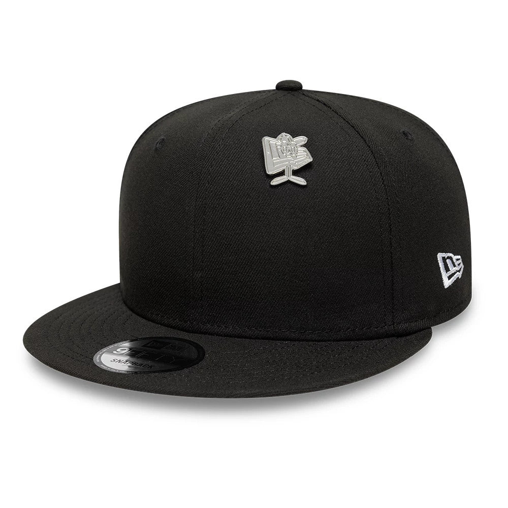 Pictured is this New Era Flag Character Pin Badge in silver. 2