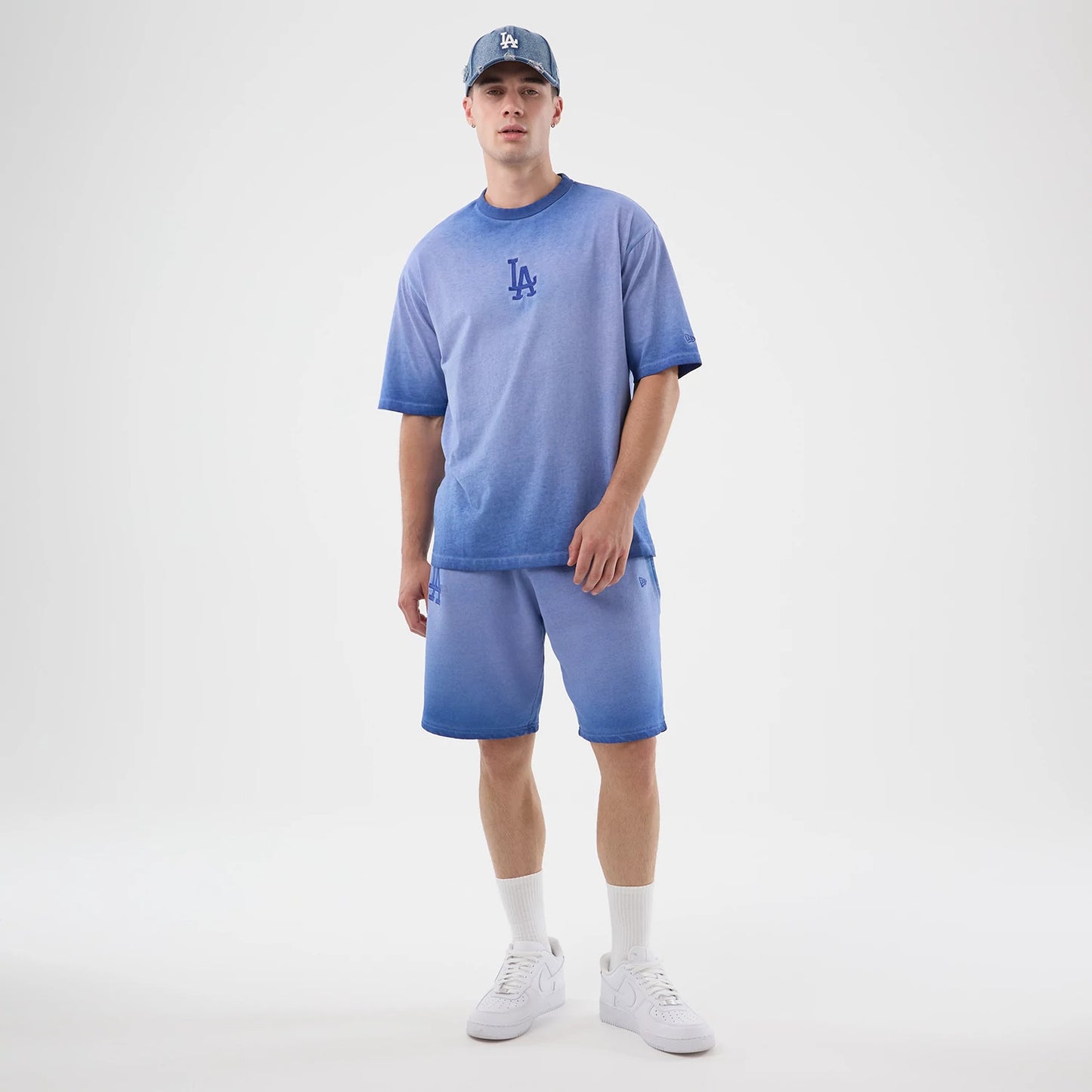The model is wearing this MLB Washed Logo LA Dodgers T-Shirt in pastel blue. 8