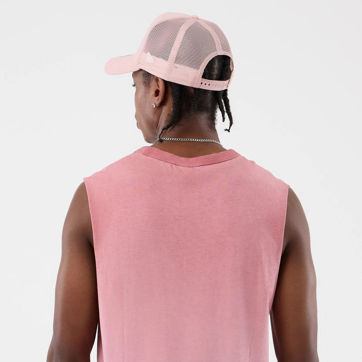 The model is wearing this MLB Washed Logo New York Yankees Vest in pastel pink. 8