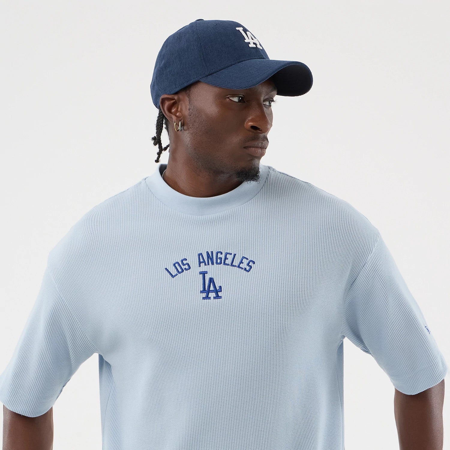 The model is wearing this MLB Waffle LA Dodgers T-Shirt in pastel blue. 4