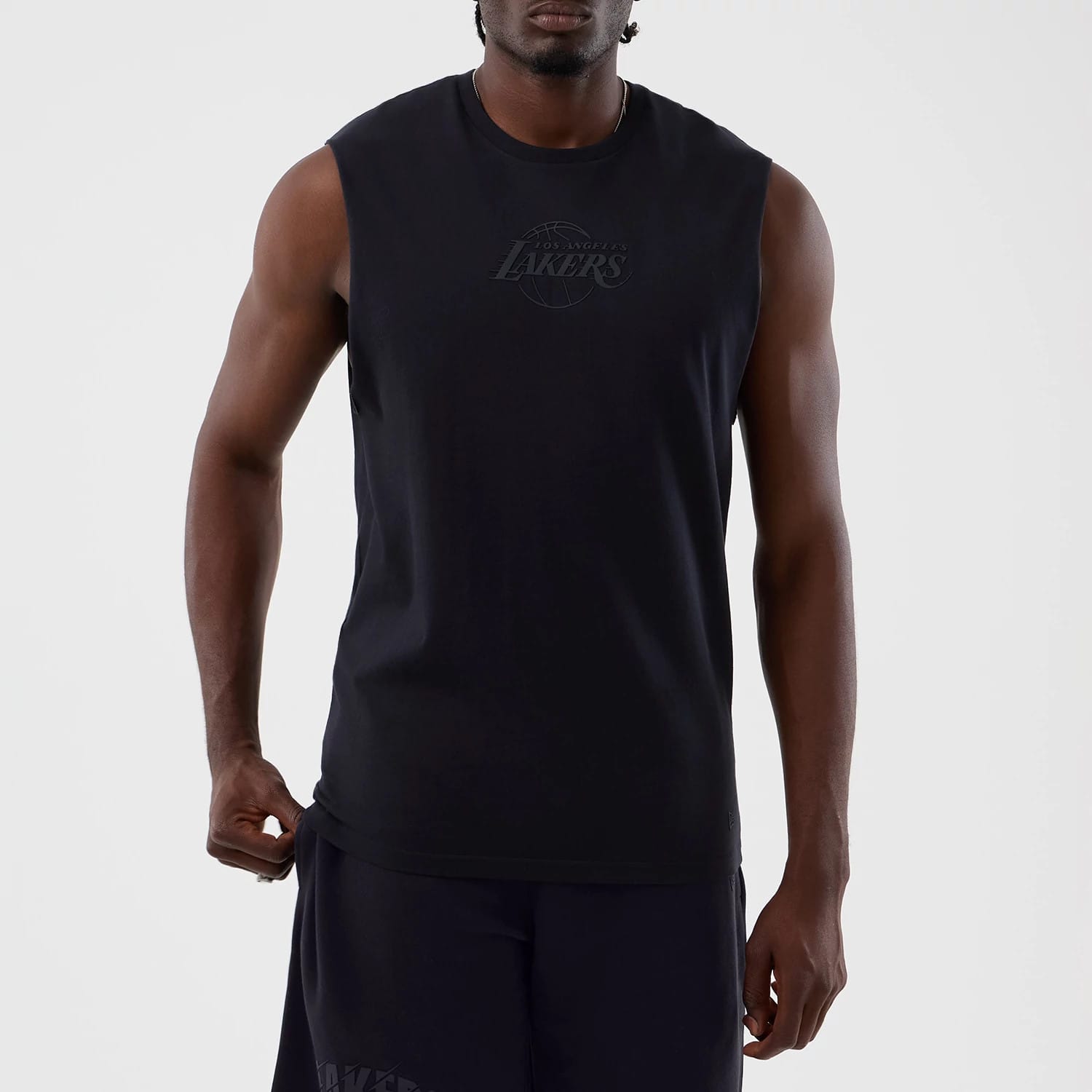 The model is wearing this NBA Core Plus LA Lakers Vest in navy. 3