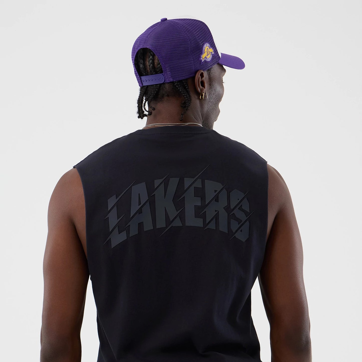 The model is wearing this NBA Core Plus LA Lakers Vest in navy. 7